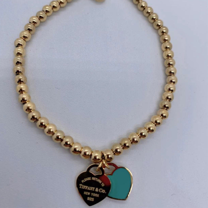 Bolsa de doble corazón al por mayor Titanio de acero Peach Corazón Costeo Amor Epoxi Pulsera Epoxi